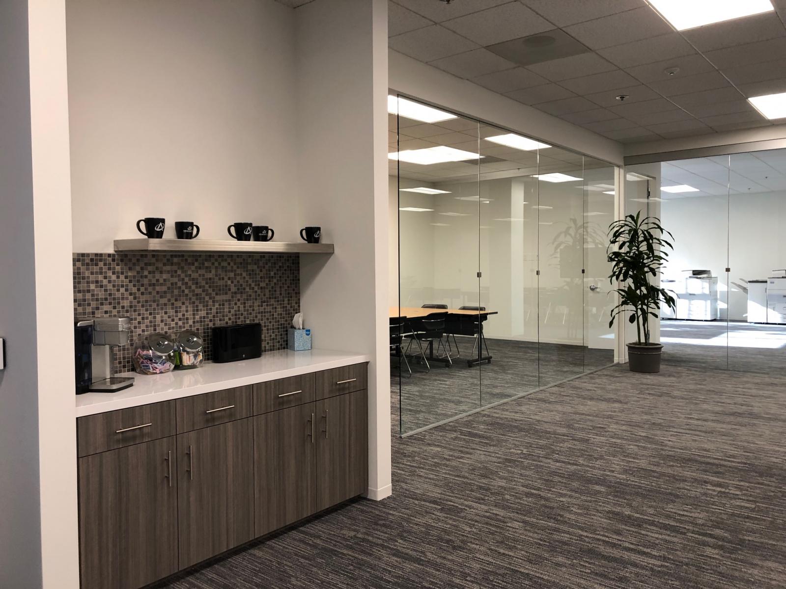 Coffee area leading to 2 conference rooms.